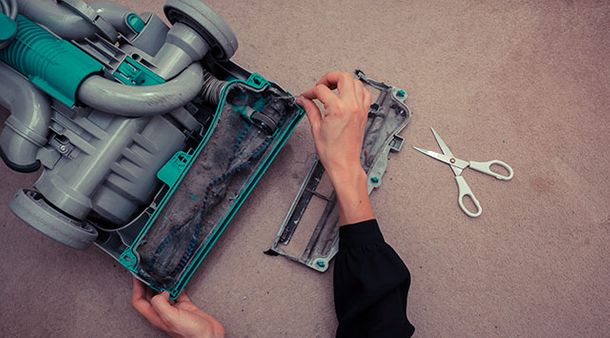 cleaning and replacing vacuum cleaner parts in Edmonton